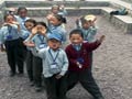 Kids waving goodbye